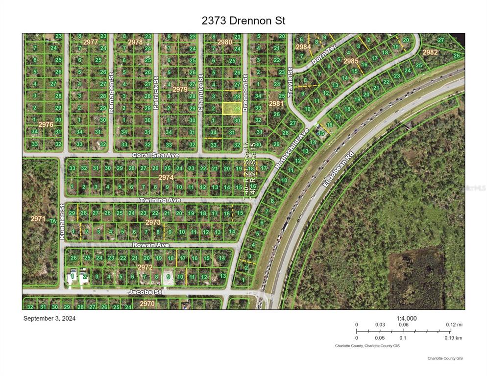 This is a map showing a residential lot highlighted in yellow on Drennon Street — 2373 DRENNON STREET, PORT CHARLOTTE, FL