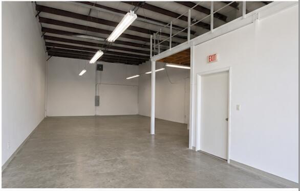 An empty commercial space with white walls, a concrete floor, and an exposed ceiling — 2150 Anntom Drive # 5, Dania Beach FL 33312, DANIA BEACH, FL