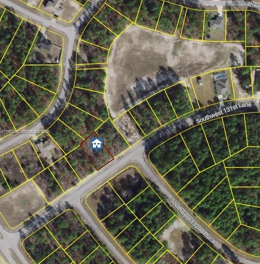 This is an aerial map showing a vacant residential lot outlined in red — 0 SW 131st Lane, Ocala FL 34473, OCALA, FL