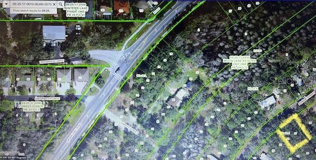 This is an aerial map showing property lines and parcel boundaries in a wooded residential area — 0 PURDUE STREET, NEW PORT RICHEY, FL