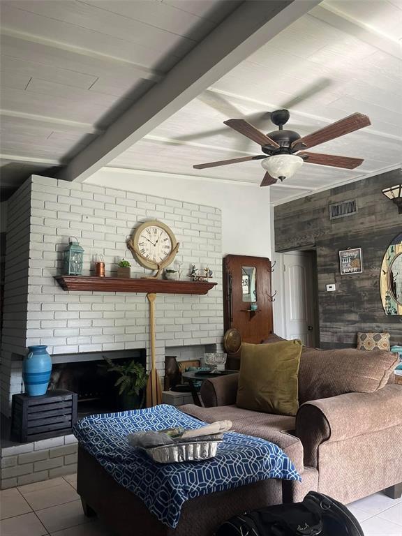 A living room features a white brick fireplace, a wooden mantel, and a ceiling fan — 1529 W RIVER LANE, TAMPA, FL