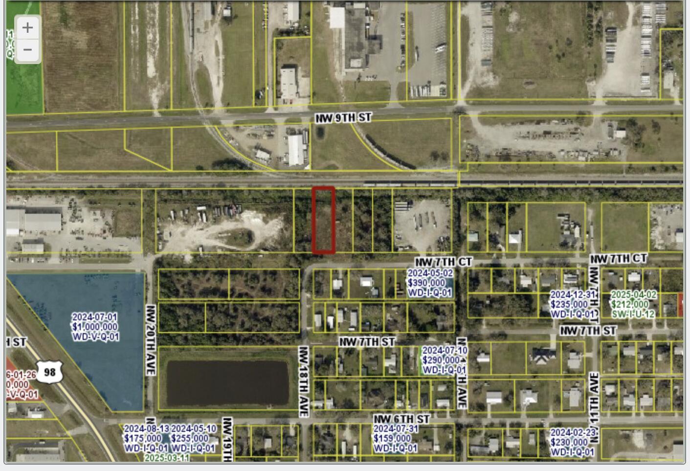 This is a satellite map showing a highlighted rectangular land parcel near a railroad track — . NW 7th Court, Okeechobee FL 34972, OKEECHOBEE, FL