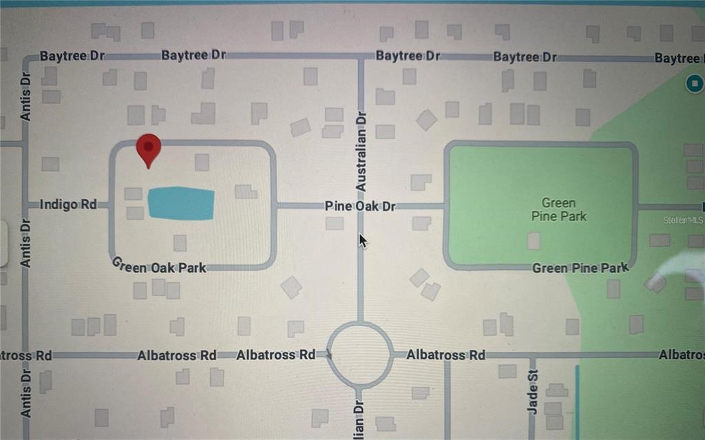 This is a map showing residential streets, Green Oak Park, and Green Pine Park — 113 GREEN OAK PARK, ROTONDA WEST, FL