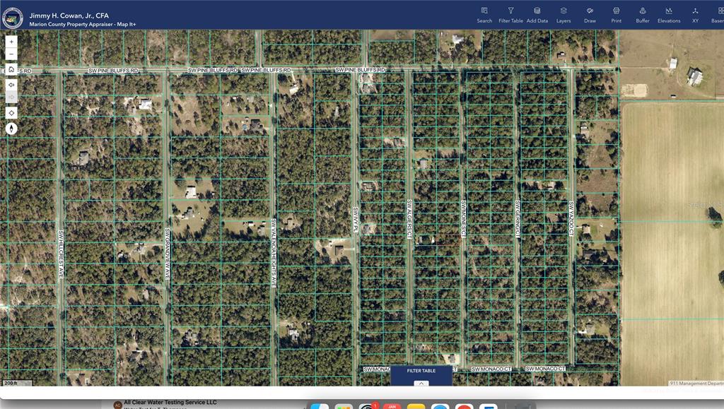 This is a satellite map view of a residential area with subdivided land parcels — 2104 SW MOINES COURT, DUNNELLON, FL