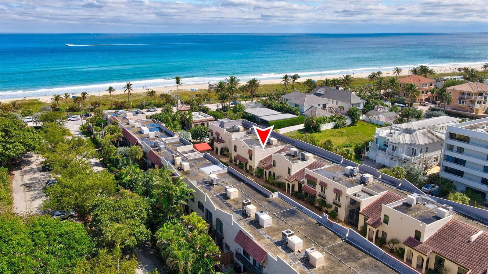 An aerial view of a multi-unit residential complex near a beach with a red marker — 200 S Ocean Boulevard # 135, Delray Beach FL 33483, DELRAY BEACH, FL