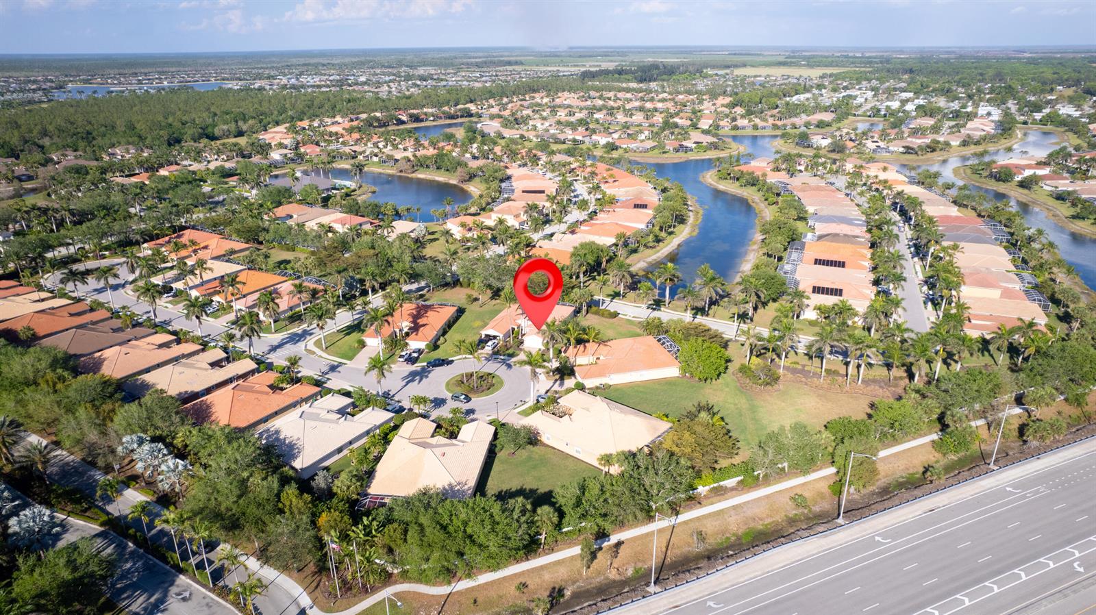 An aerial view shows a residential neighborhood with a red location pin marking a house — 14190 Fall Creek Court, Naples FL 34114, NAPLES, FL
