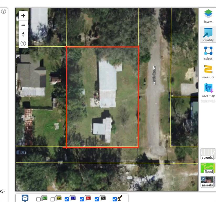 This is a map view showing a residential property lot outlined in red on Janie Lane — 2795 JANIE LANE, BARTOW, FL