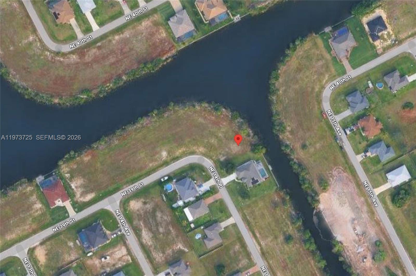 This is an aerial map view of a vacant residential lot situated along a canal — 3779 NE 14th Pl, Cape Coral FL 33909, CAPE CORAL, FL