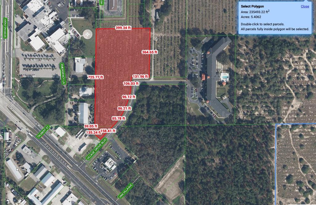 An aerial map shows a highlighted 5.4-acre parcel of land near a commercial area — 2000 VILLAGE GROVE BOULEVARD, SEBRING, FL