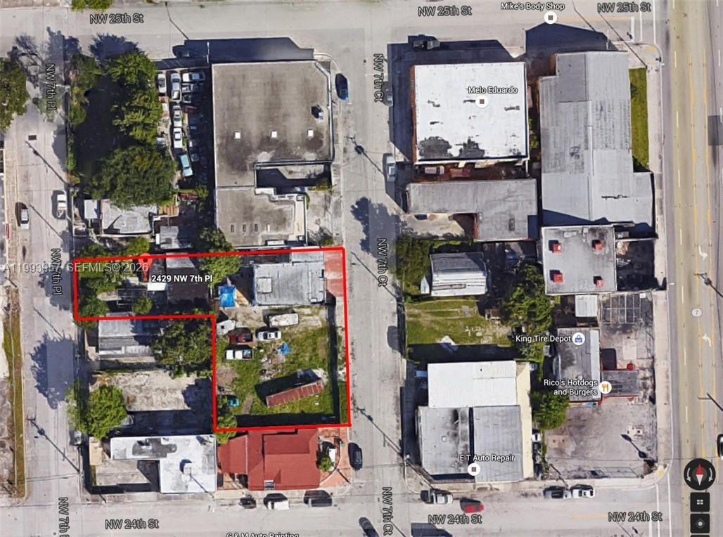 An aerial map view shows a rectangular property lot outlined in red within a city — 2410 NW 7th Ct, Miami FL 33127, MIAMI, FL