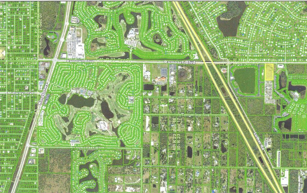 This is an aerial map showing residential neighborhoods, roads, and undeveloped land — 25335 RAMPART BOULEVARD, PUNTA GORDA, FL