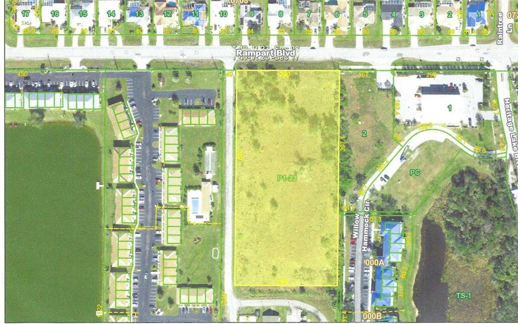 This is an aerial map showing a vacant rectangular lot bordered by roads and buildings — 25335 RAMPART BOULEVARD, PUNTA GORDA, FL