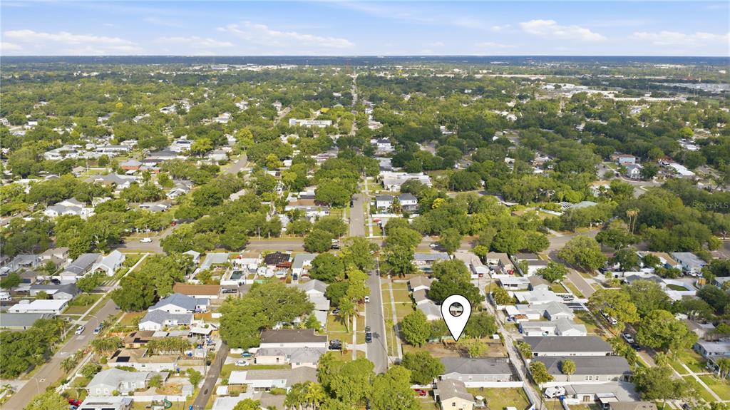 An aerial view of a residential neighborhood with a location pin marking a specific lot — 845 50TH AVENUE N, ST PETERSBURG, FL