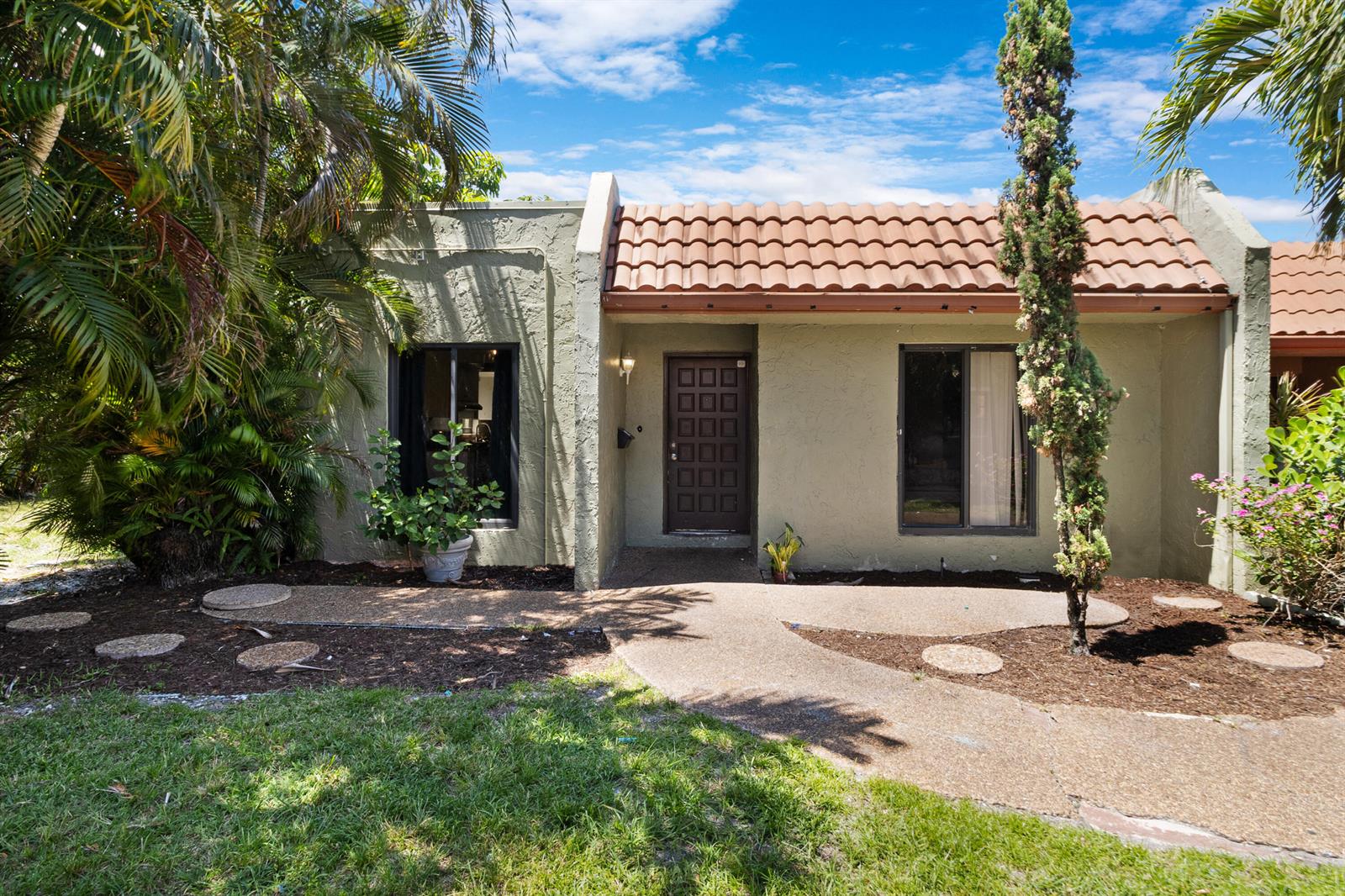 A single-story stucco house with a brown tile roof and a front walkway — 153 SE 7th Street # 1, Deerfield Beach FL 33441, DEERFIELD BEACH, FL