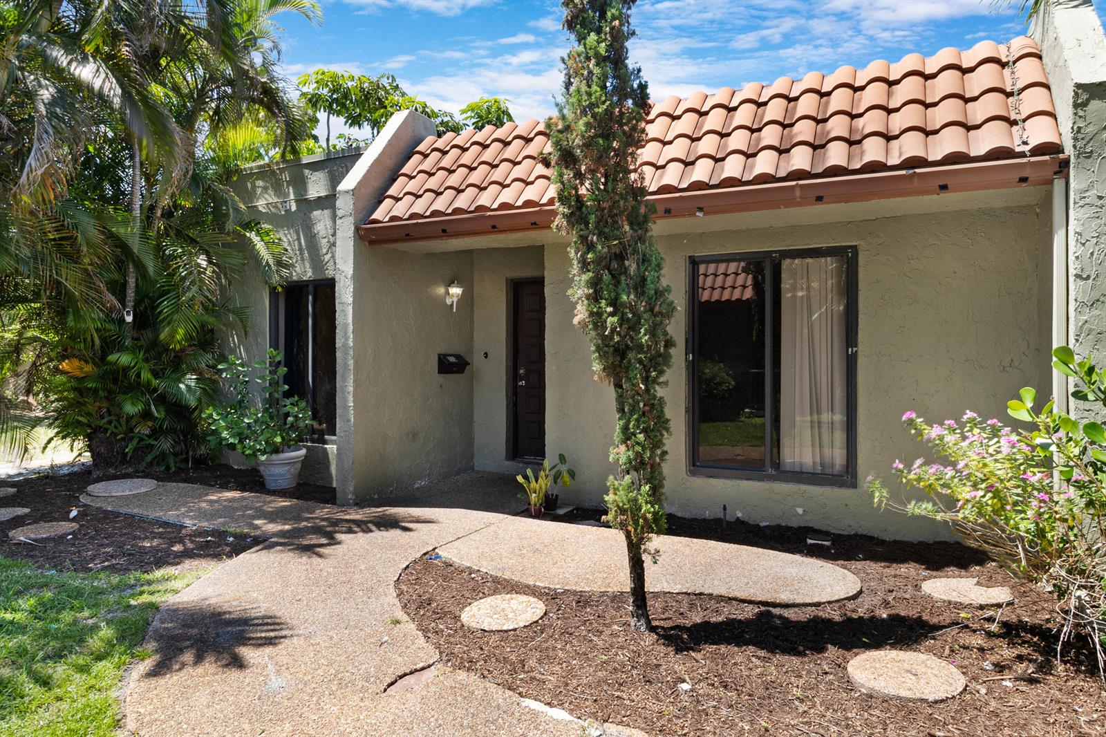A single-story house with a tiled roof, stucco exterior, and a curved concrete walkway — 153 SE 7th Street # 1, Deerfield Beach FL 33441, DEERFIELD BEACH, FL