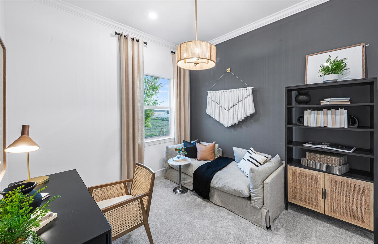 A home office features a desk, a daybed against a dark wall, and a bookshelf — 19925 Nickel Trail, Punta Gorda FL 33982, PUNTA GORDA, FL