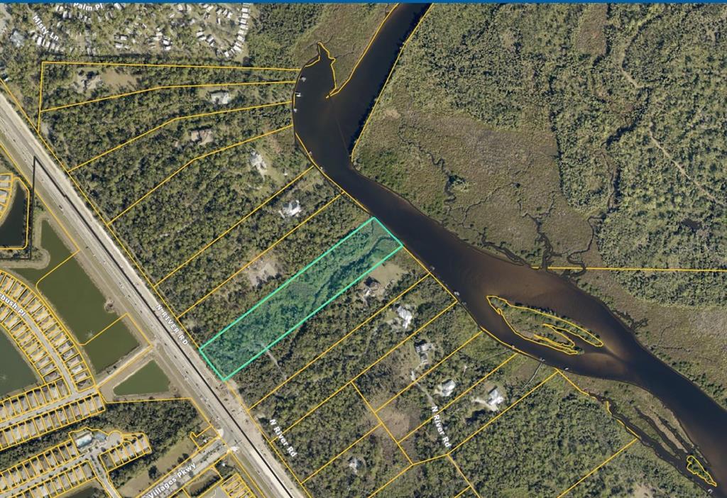 An aerial map shows a rectangular parcel of land highlighted in teal along a river — 770 N RIVER ROAD UNIT 7, VENICE, FL