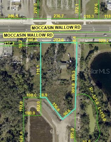 This is an aerial map showing property boundaries and dimensions for a parcel of land — 2519 MOCCASIN WALLOW ROAD, PALMETTO, FL