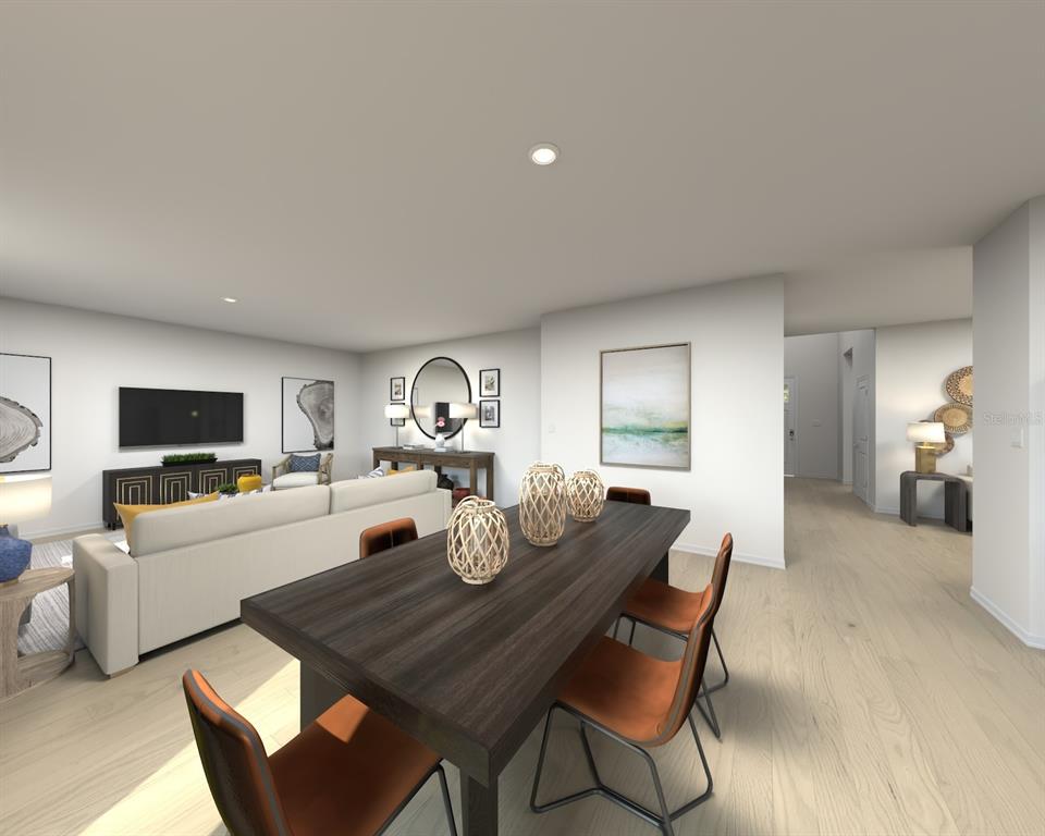 This is a digital rendering of an open-concept dining and living area with wood flooring — 5194 GREEN BELT DRIVE, HAINES CITY, FL