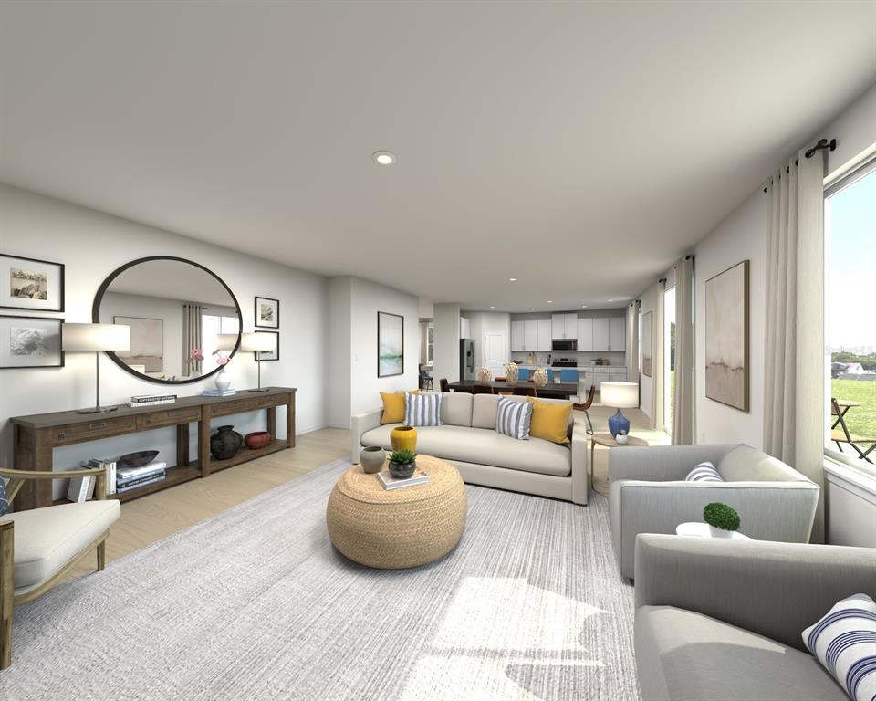 This is a rendering of an open-concept living room with a kitchen in the background — 5194 GREEN BELT DRIVE, HAINES CITY, FL
