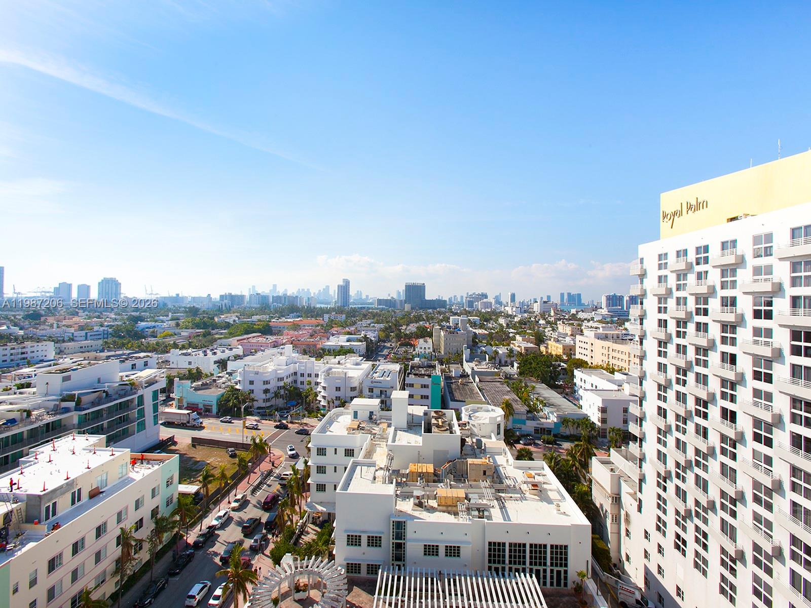 An elevated exterior view of a city skyline with a large hotel building on the right — 1500 Ocean Dr # 10, Miami Beach FL 33139, MIAMI BEACH, FL