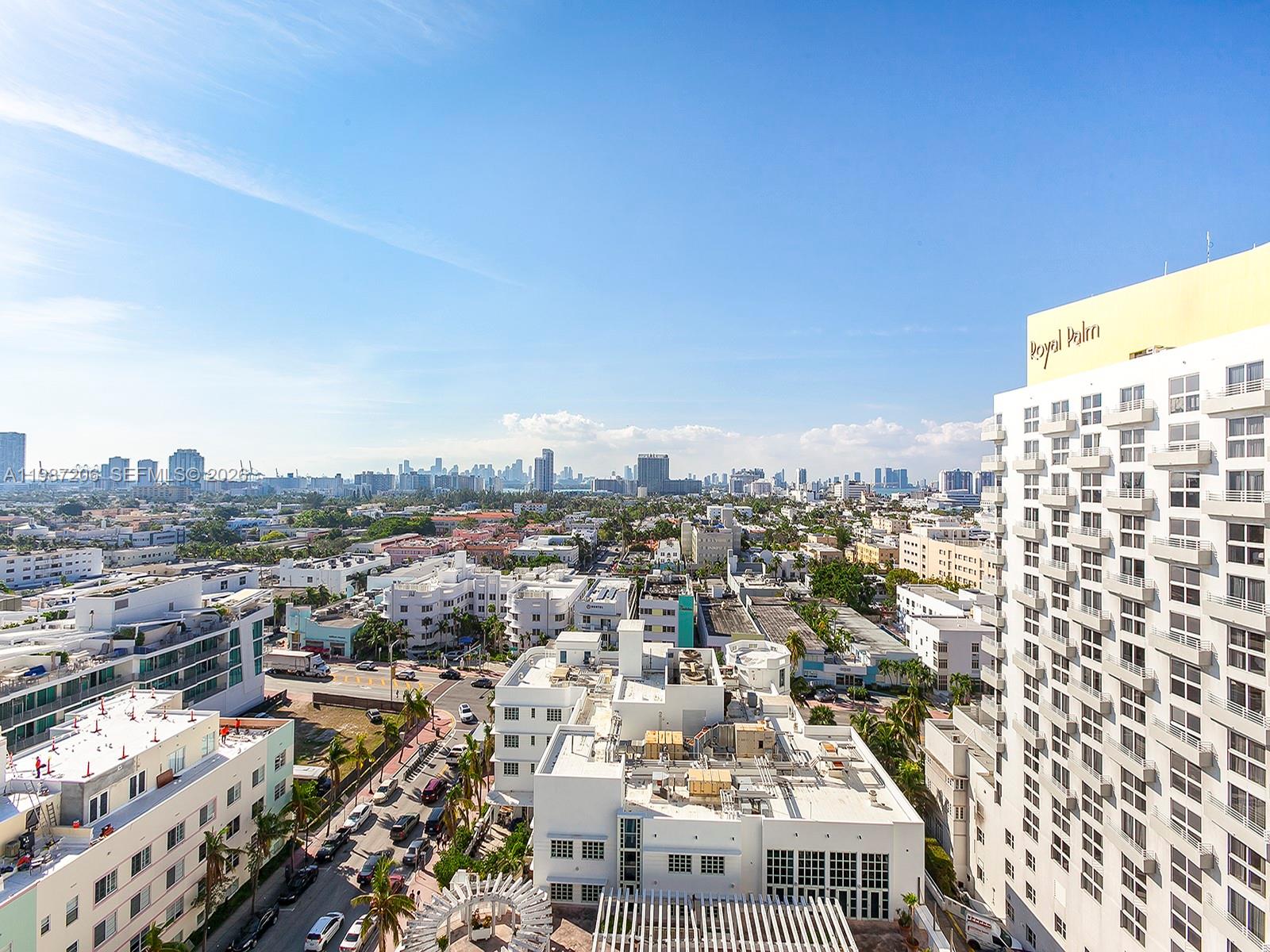 An elevated view of a city skyline with white buildings and a large hotel — 1500 Ocean Dr # 10, Miami Beach FL 33139, MIAMI BEACH, FL