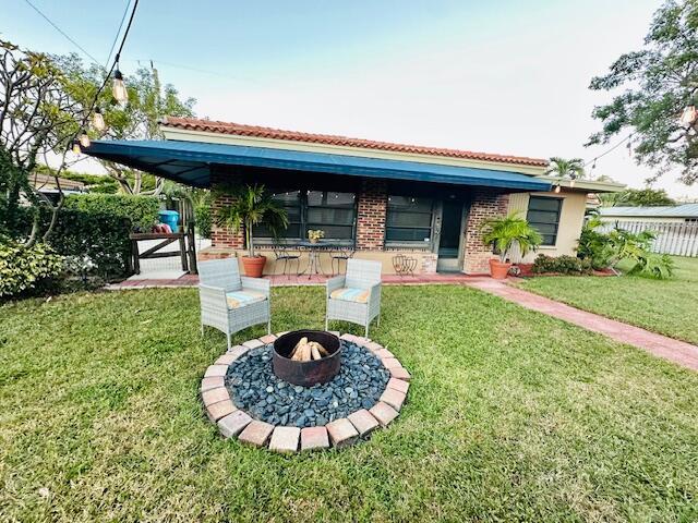 A single-story house with a red tile roof and a large tree in the yard — 815 South Road, Boynton Beach FL 33435, BOYNTON BEACH, FL