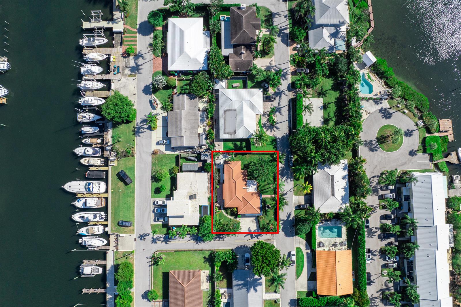 A single-story house with a red tile roof and a blue awning over the patio — 815 South Road, Boynton Beach FL 33435, BOYNTON BEACH, FL