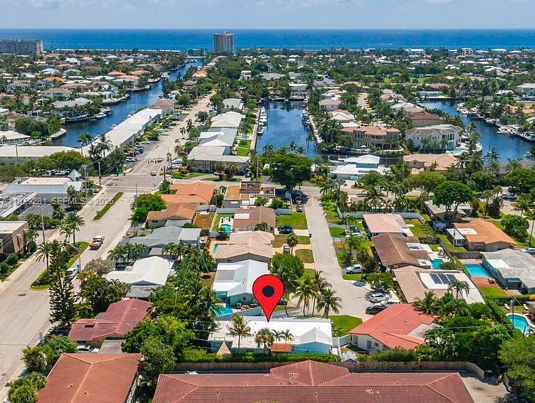 This is an aerial view of a residential neighborhood with a red location pin — 2211 NE 35th Ct, Lighthouse Point FL 33064, LIGHTHOUSE POINT, FL