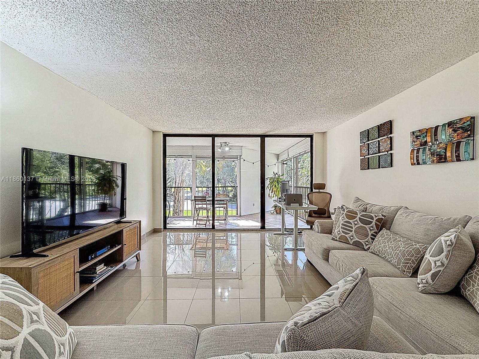 16475 Golf Club Rd # 202, Weston FL 33326