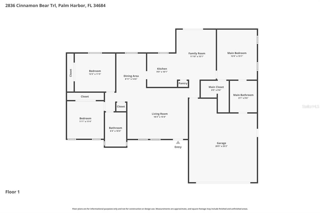 A narrow side yard with a sandy lawn, wooden fence, and exterior house wall — 2836 CINNAMON BEAR TRAIL, PALM HARBOR, FL