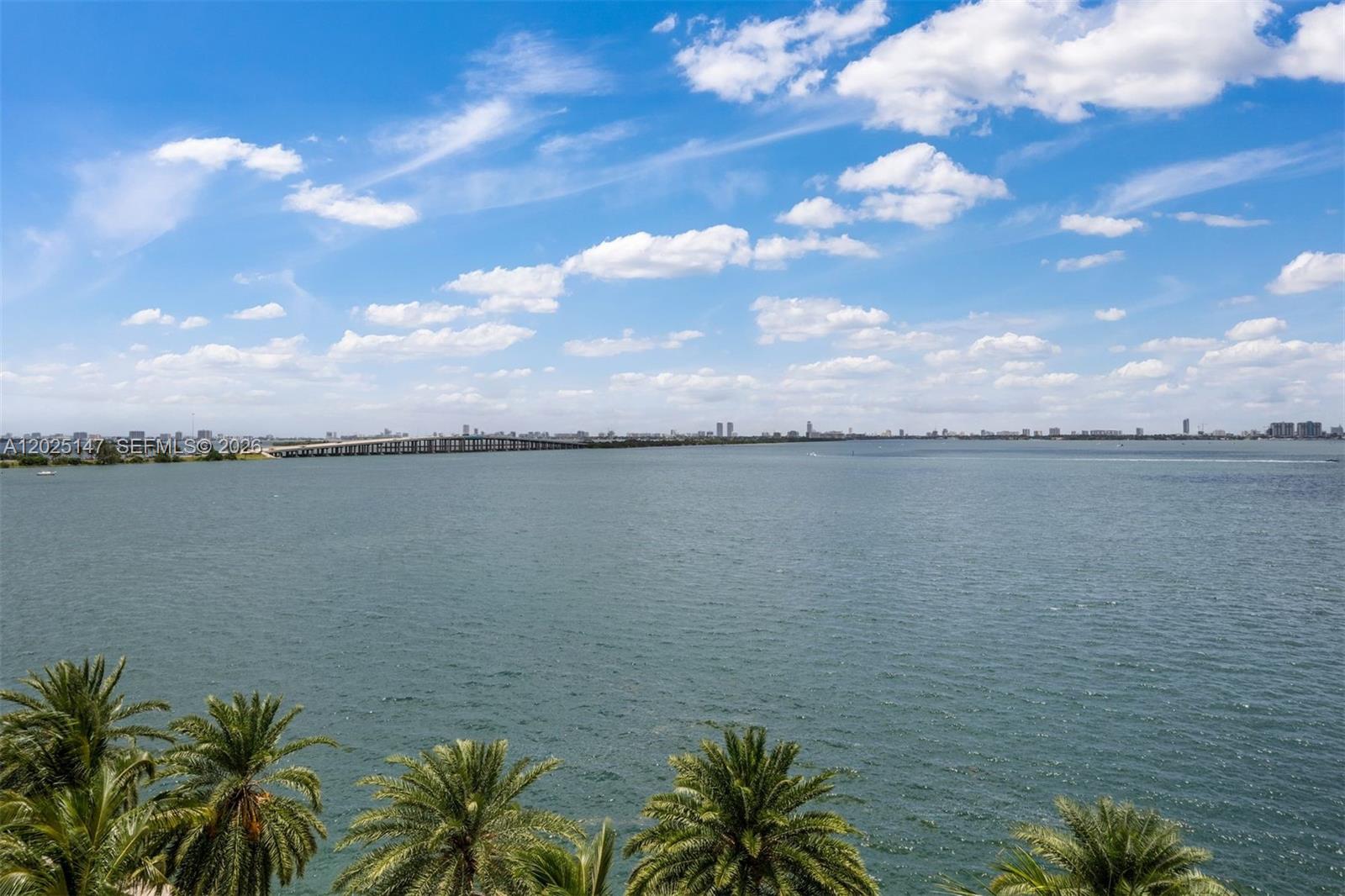 A view of a large body of water with a bridge and distant city skyline — 2900 NE 7th Ave # 504, Miami FL 33137, MIAMI, FL