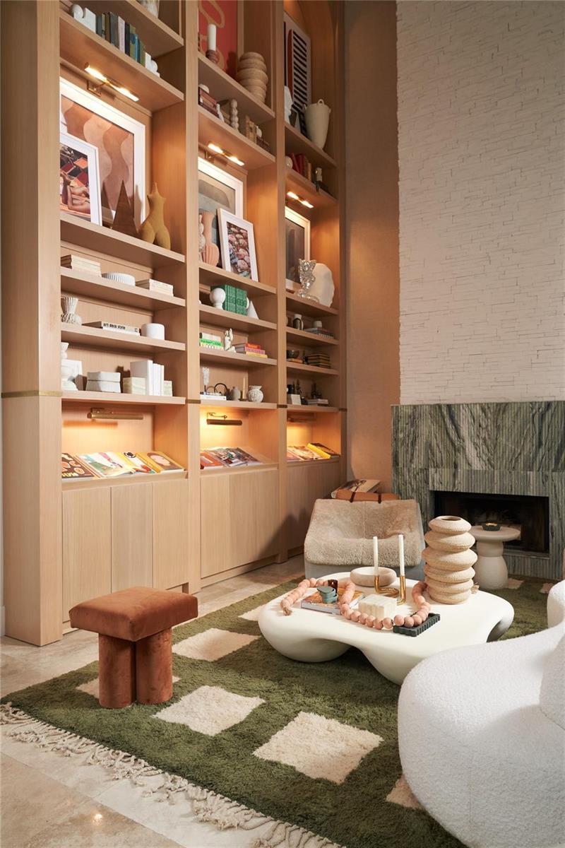 A living room features light wood built-in shelving, a green checkered rug, and a fireplace — 2765 Brickell Court, Miami FL 33129, MIAMI, FL