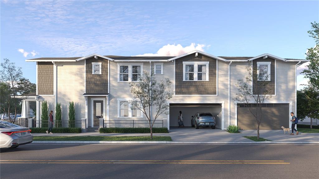 This architectural rendering shows the exterior of a multi-unit townhouse with garages and landscaping — 3110 N TAMPA STREET UNIT 2, TAMPA, FL