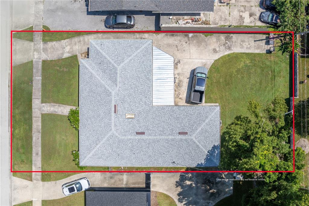 An aerial view shows a house with a gray roof on a rectangular lot — 2502 VINE STREET, ORLANDO, FL