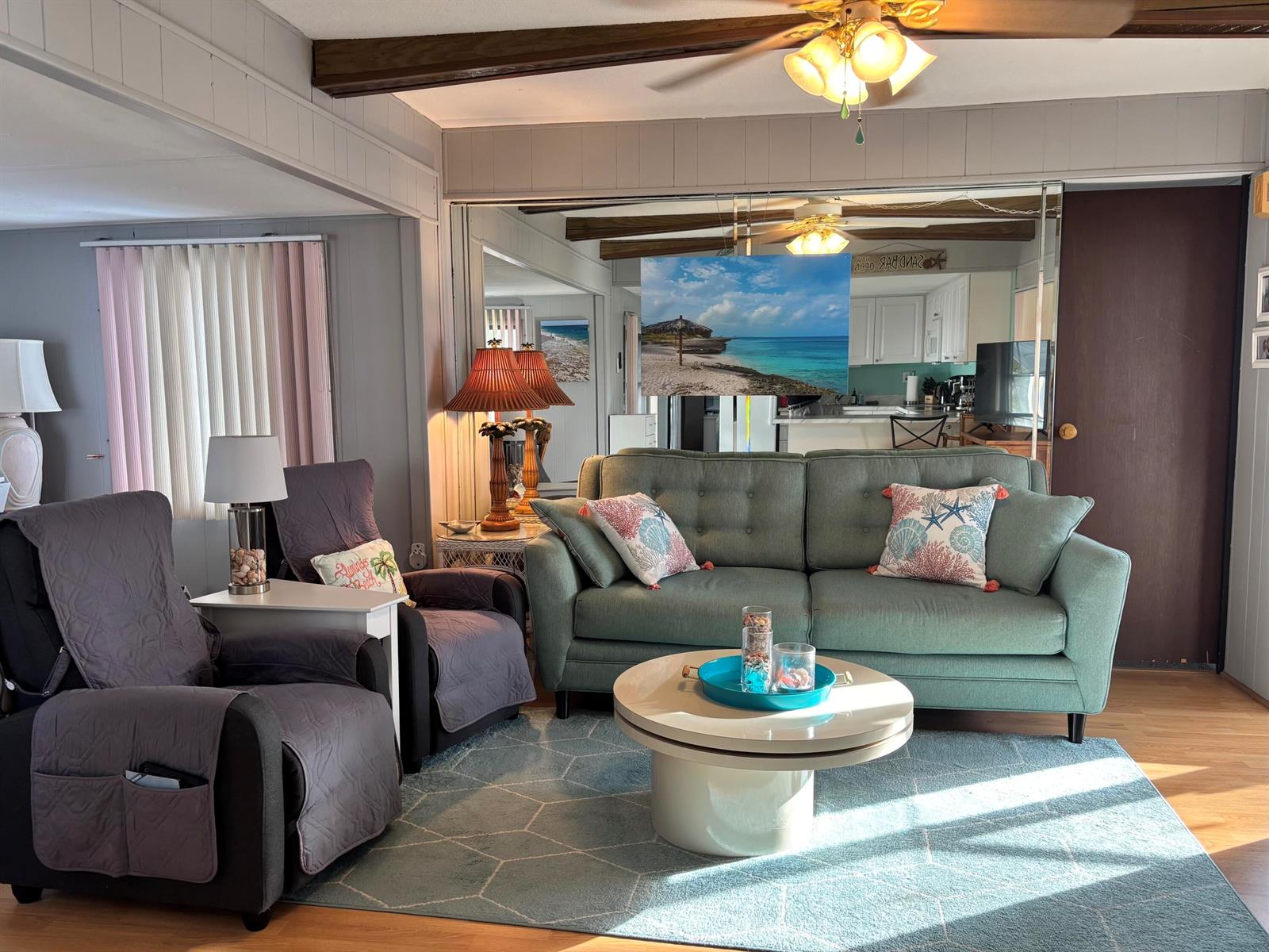 A living room features a green sofa, two gray recliners, and a round coffee table — 4121 88th Court S, Boynton Beach FL 33436, BOYNTON BEACH, FL