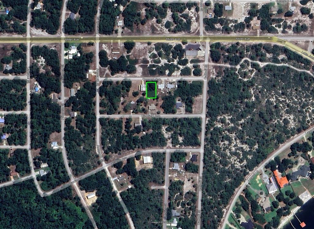 This is an aerial map showing a rectangular property lot highlighted in green — 3110 CONCORD AVENUE, LAKE PLACID, FL