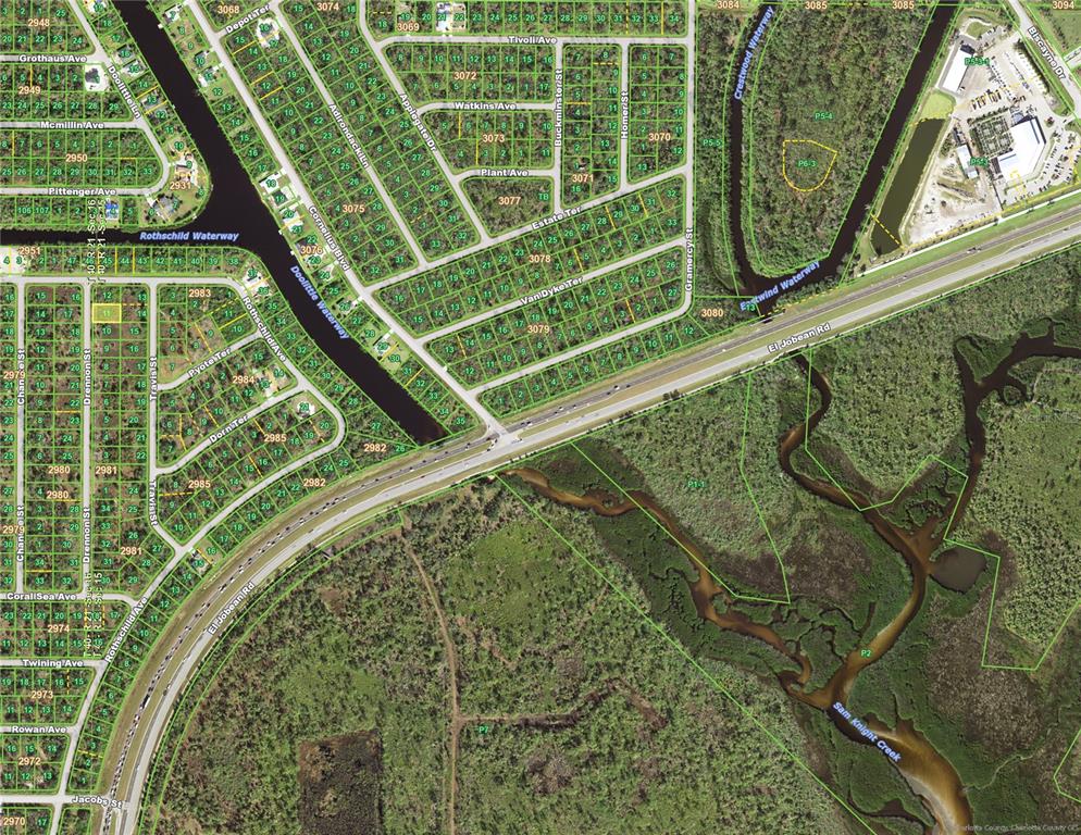 This is a satellite map showing a residential neighborhood grid intersected by waterways and roads — 2280 DRENNON STREET, PORT CHARLOTTE, FL