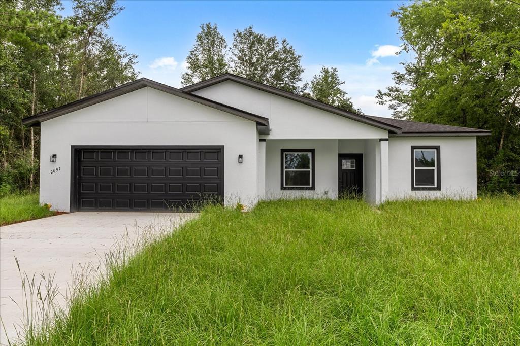 2097 SW 153RD LOOP, OCALA, FL — photo 2 of 30