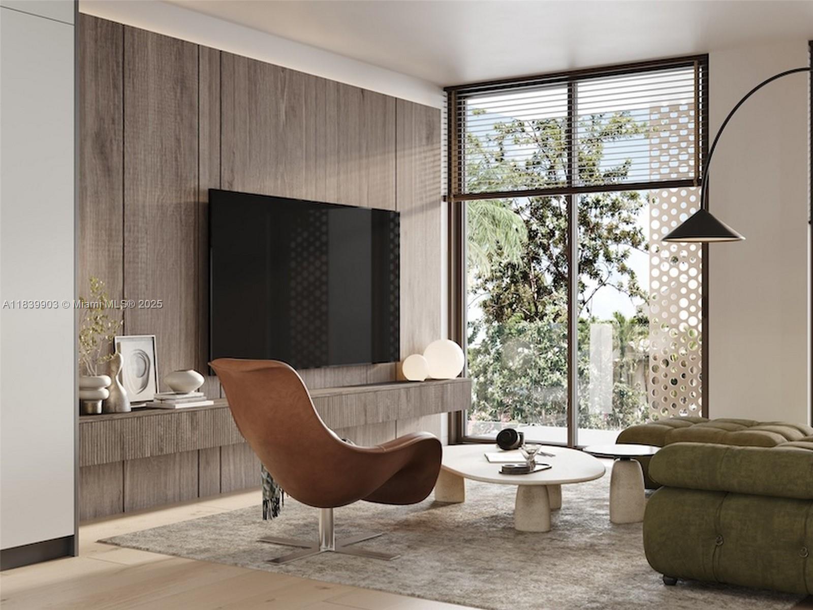 This rendering shows a modern living room with wood paneling, a television, and outdoor views — 1709 Jefferson Ave # 08, Miami Beach FL 33139, MIAMI BEACH, FL