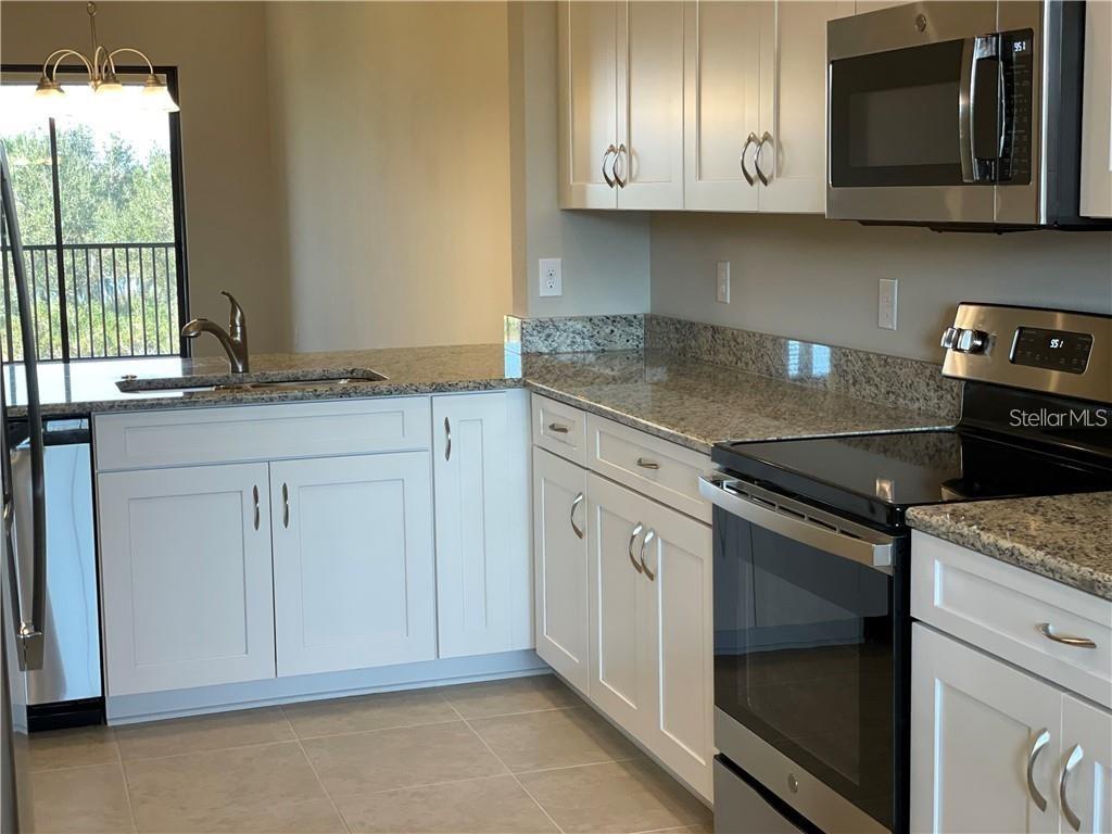 13823 MESSINA LOOP UNIT 203, BRADENTON, FL — photo 4 of 15