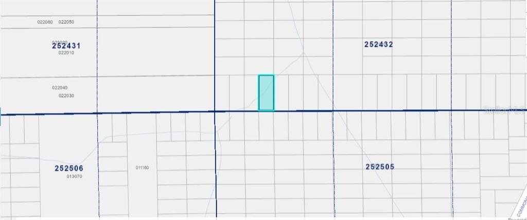 This is a plat map showing a highlighted rectangular parcel of land — COMMONWEALTH AVE N, POLK CITY, FL