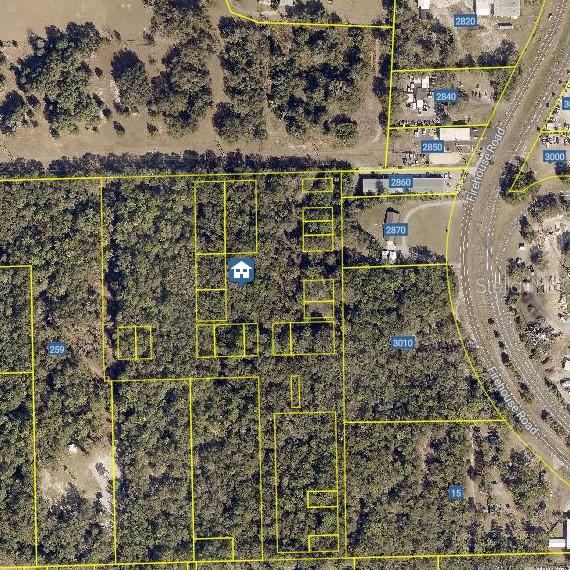 This is an aerial map showing property boundaries and parcel numbers in a wooded area — NO STREET, ORANGE CITY, FL