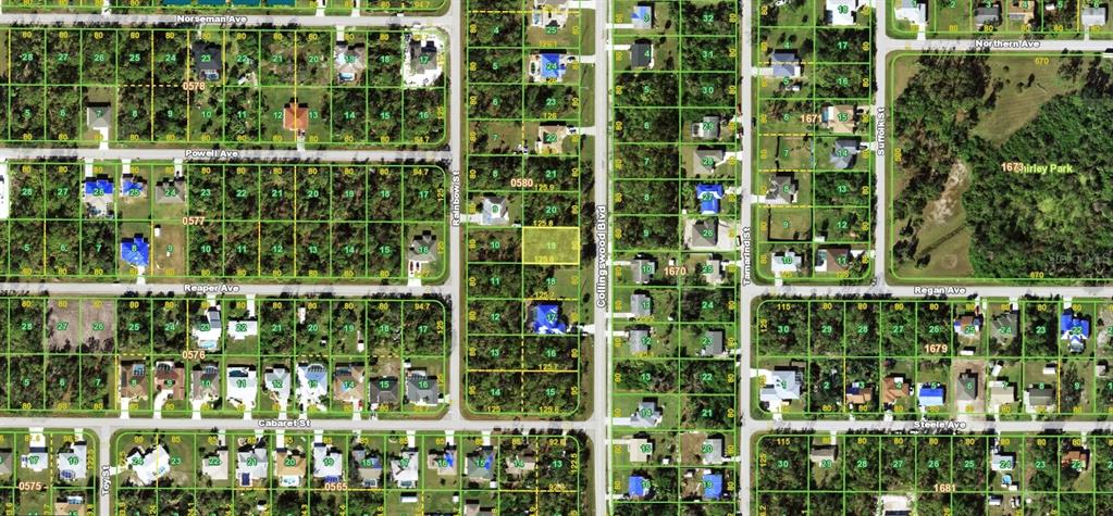 This is an aerial map showing a residential neighborhood with subdivided land plots and streets — 2463 COLLINGSWOOD BOULEVARD, PORT CHARLOTTE, FL