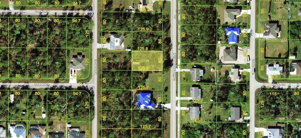 This is a satellite map showing residential lots and streets in a suburban neighborhood — 2463 COLLINGSWOOD BOULEVARD, PORT CHARLOTTE, FL