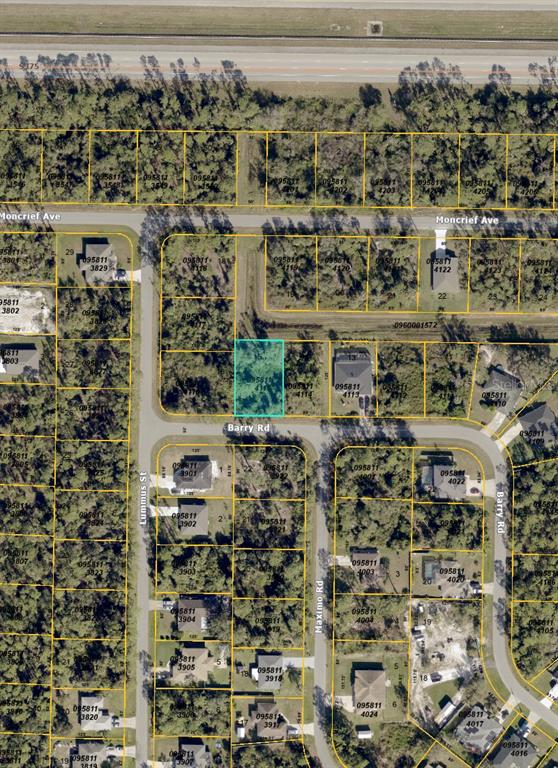 This is an aerial map showing a highlighted vacant lot surrounded by residential properties — BARRY ROAD, NORTH PORT, FL