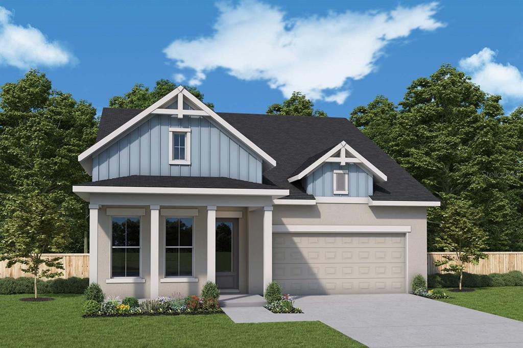 A modern kitchen features white cabinetry, a large quartz island, and light wood flooring — 6821 CHLOE COURT, SARASOTA, FL
