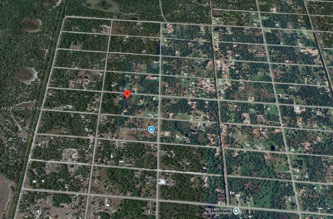 This is an aerial map view of a rural residential area with a red location pin — 745 S Mayoral St, Clewiston FL 33440, CLEWISTON, FL