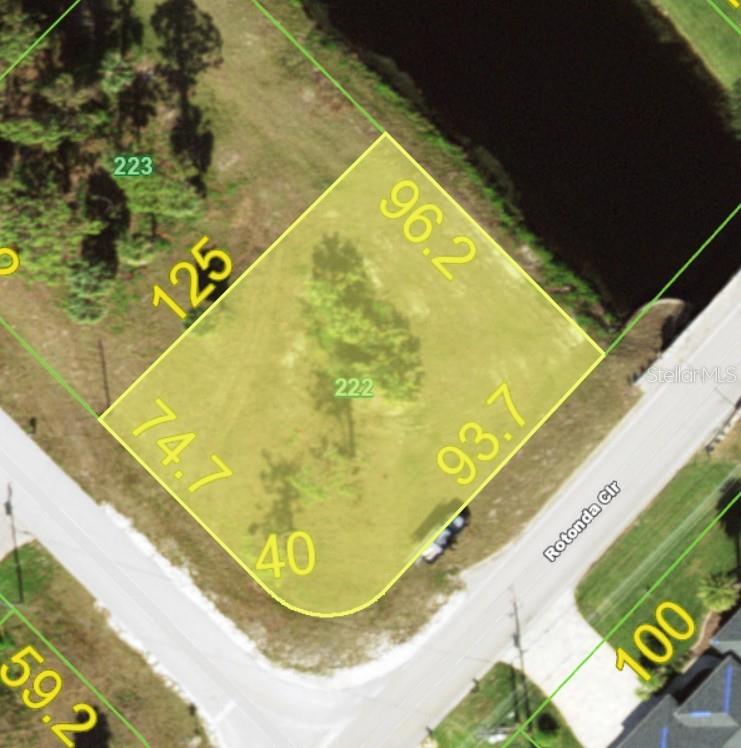 This aerial map shows a vacant, irregularly shaped residential lot located on a corner — 1026 ROTONDA CIRCLE, ROTONDA WEST, FL