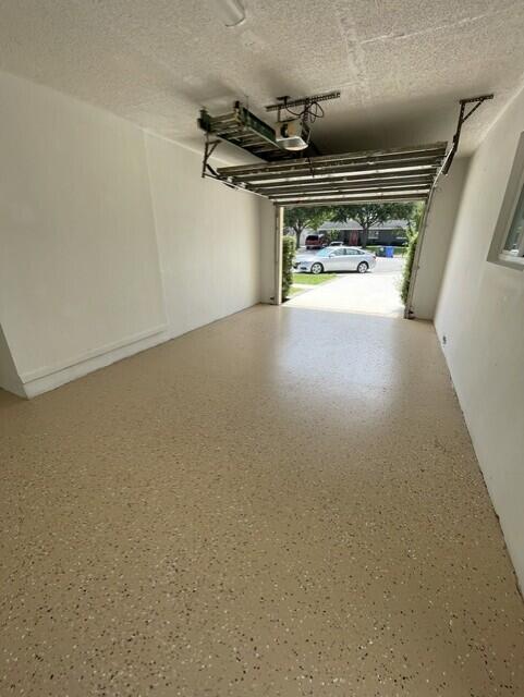 An empty room with light-colored tile flooring, recessed ceiling lights, and a ceiling fan — 180 SW 77th Avenue, Margate FL 33068, MARGATE, FL